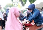 Ratusan-Warga-Manfaatkan-Layanan-Kesehatan-Gratis-Polda-Jatim-di-CFD-Hari-Bhayangkara-ke--79